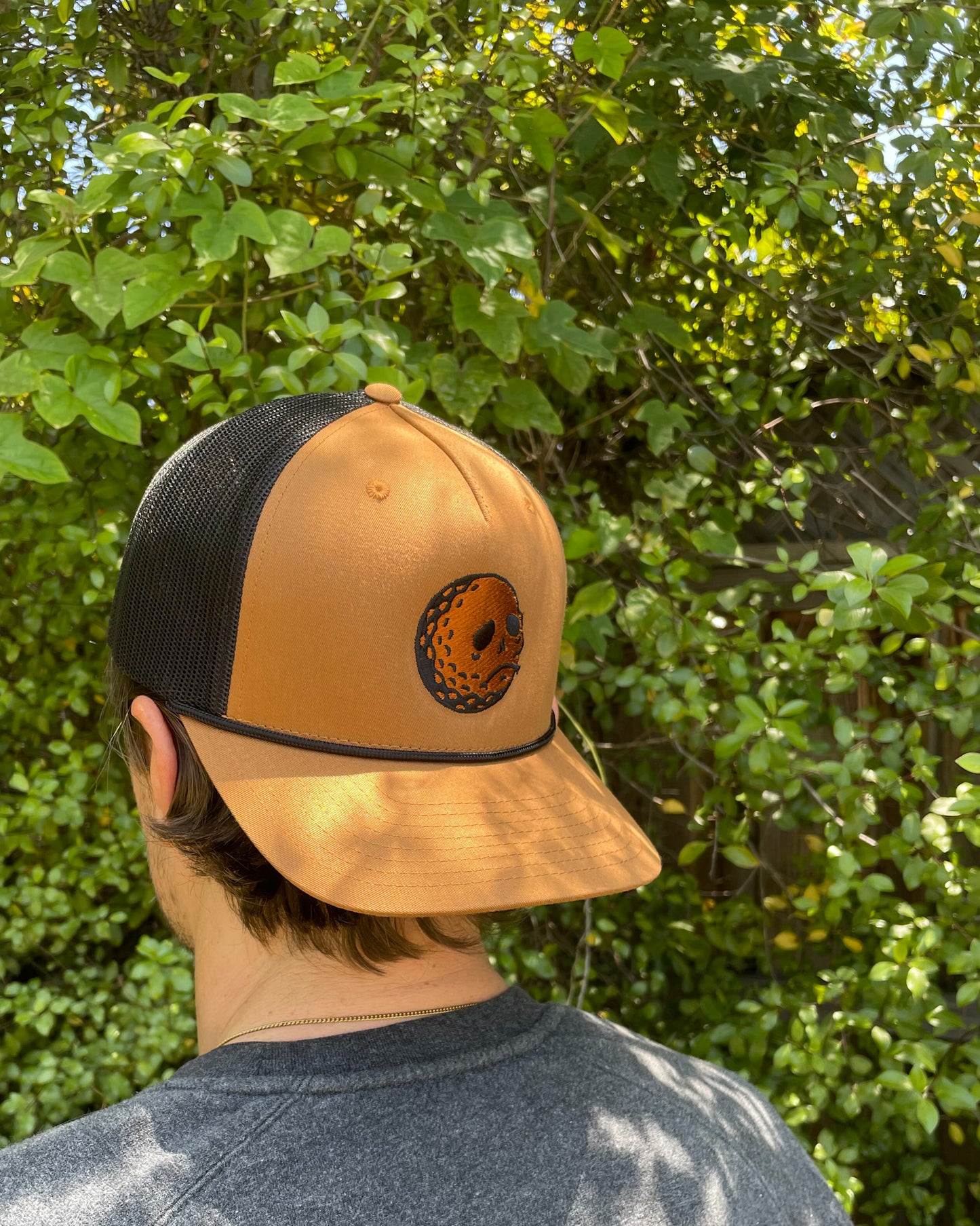 skully embroidered trucker hat